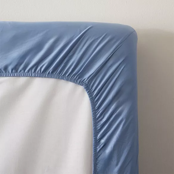 sábana bajera ajustable azul cuatro puntos ajuste